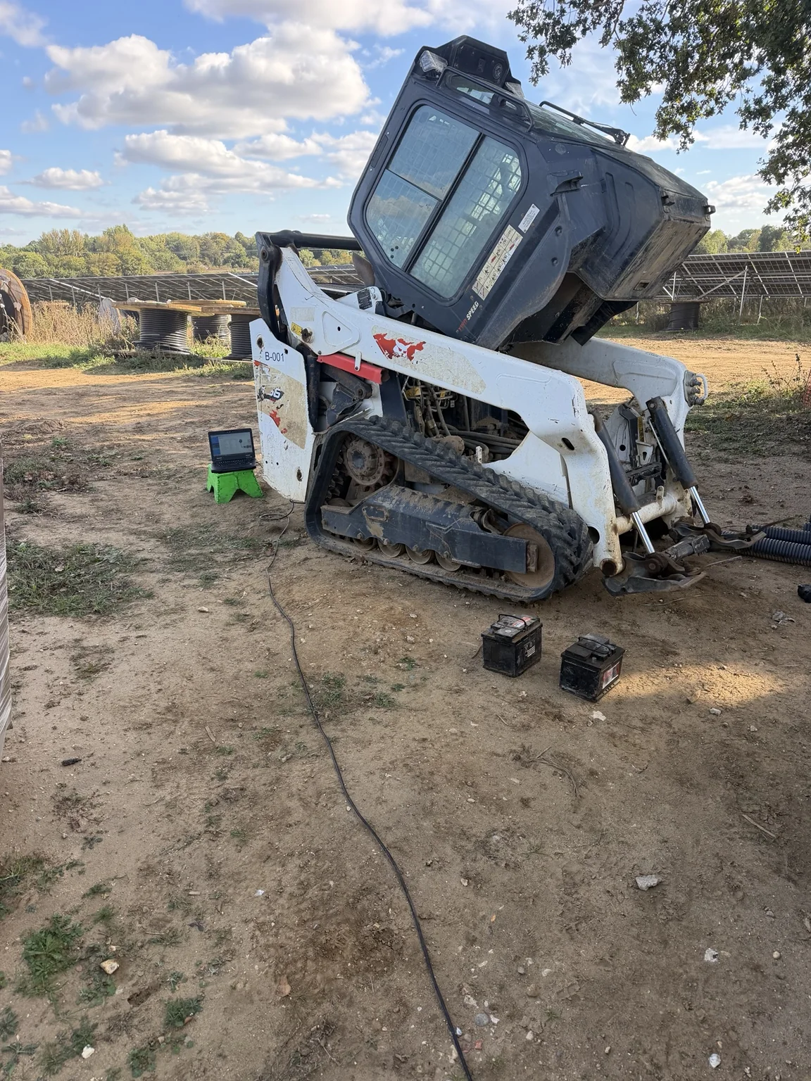 Eden Energy Bobcat compact track loader during specialist electrical fault diagnosis by Hawes & Son Ltd